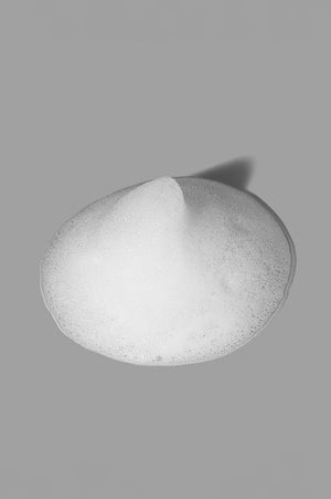 Whitening Cleansing Foam texture close-up – rich foaming brightening formula